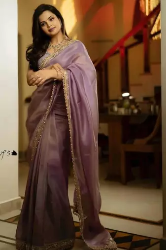 Lavender color embroidered tissue silk blend saree