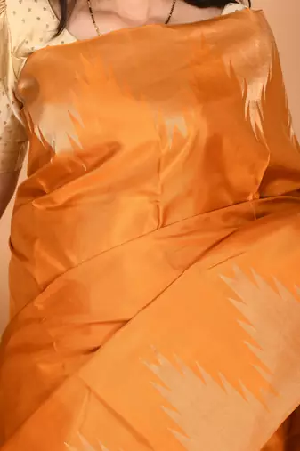 Turmeric yellow temple border kanchi silk saree with blouse