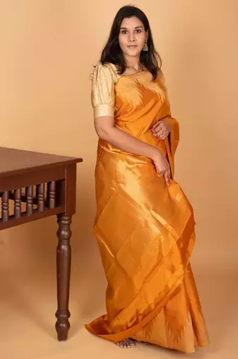 Turmeric yellow temple border kanchi silk saree with blouse