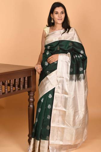 Bottle green and dusky white retta patta border pure kanchi silk saree