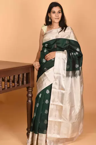 Bottle green and dusky white retta patta border pure kanchi silk saree
