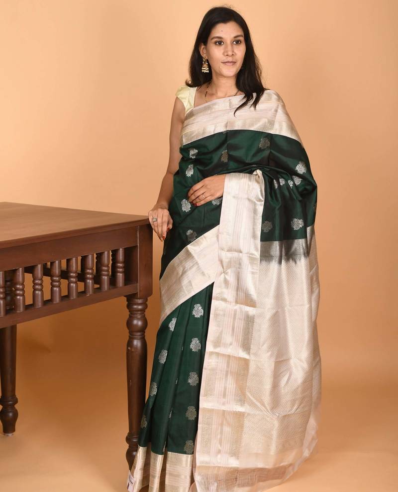 Bottle green and dusky white retta patta border pure kanchi silk saree