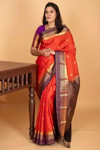 Pumpkin orange and eggplant purple butta weave kanchi pure silk saree