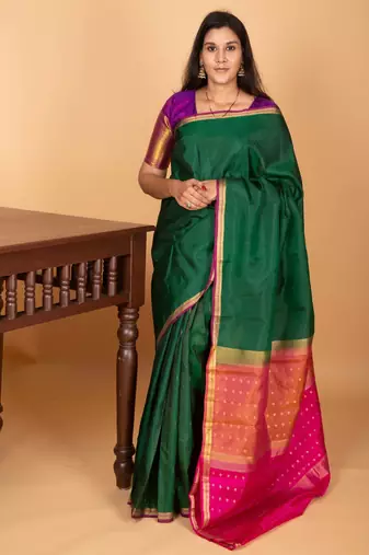 Bottle green and rani pink partly pleats pure kanjivaram silk saree