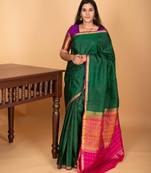 Bottle green and rani pink partly pleats pure kanjivaram silk saree