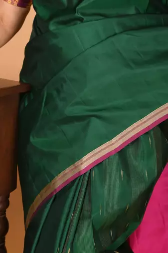 Bottle green and rani pink partly pleats pure kanjivaram silk saree