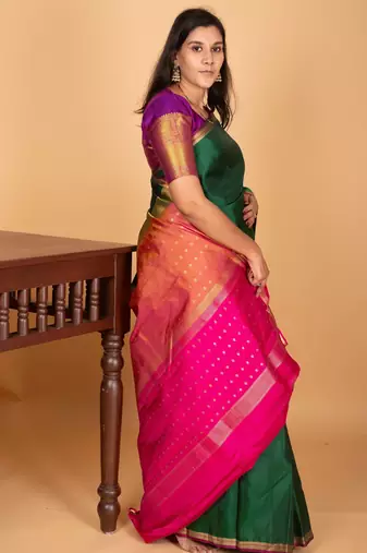 Bottle green and rani pink partly pleats pure kanjivaram silk saree