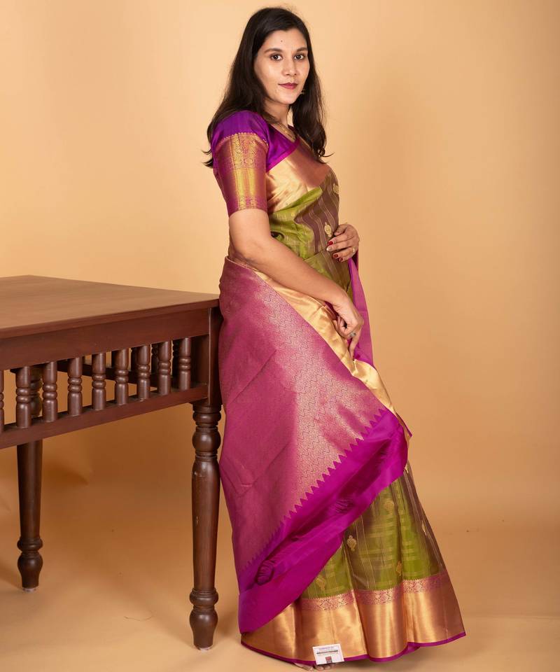 Dual tone green and magenta checked pure kanjivaram silk saree