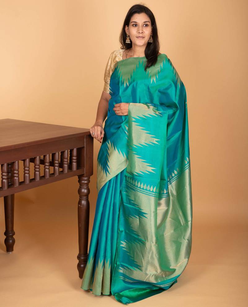 Dual tone blue temple border pure kanchi silk saree
