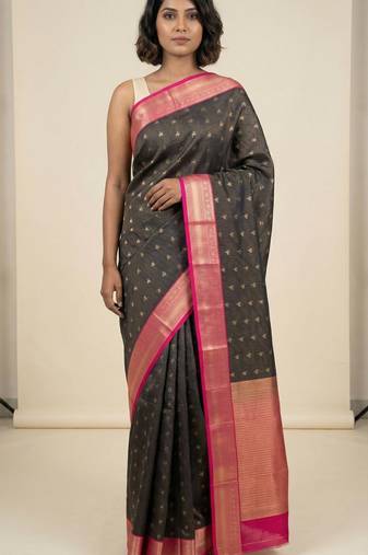 Black and rani pink vairaoosi semi silk saree