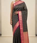 Black and rani pink vairaoosi semi silk saree