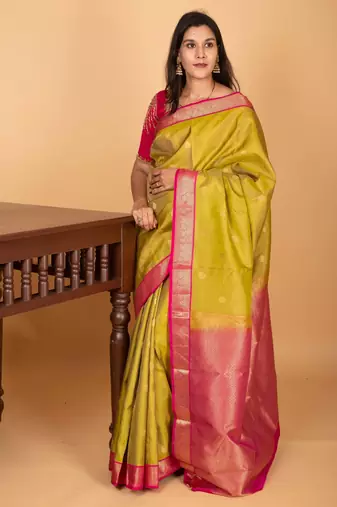 Pear green and rani pink small border pure kanjivaram silk saree