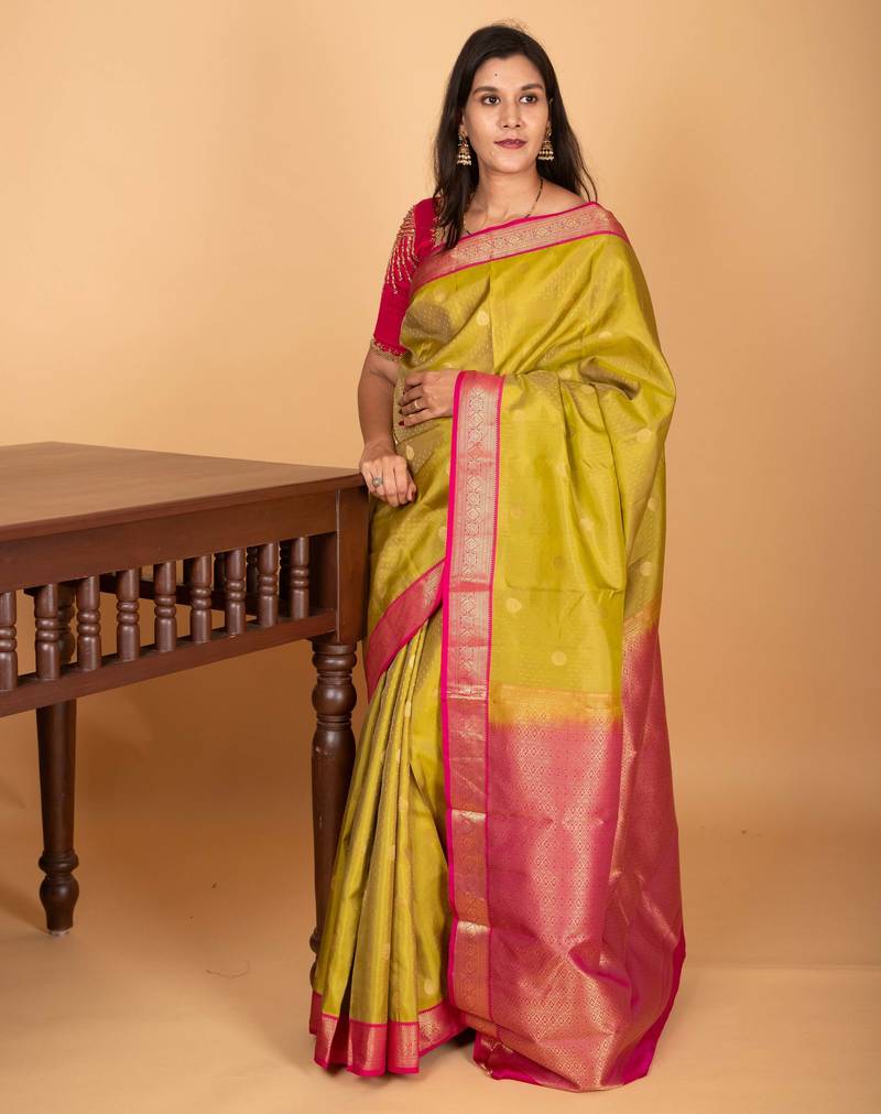 Pear green and rani pink small border pure kanjivaram silk saree