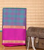 Peacock green and purple checked pure touch silk saree