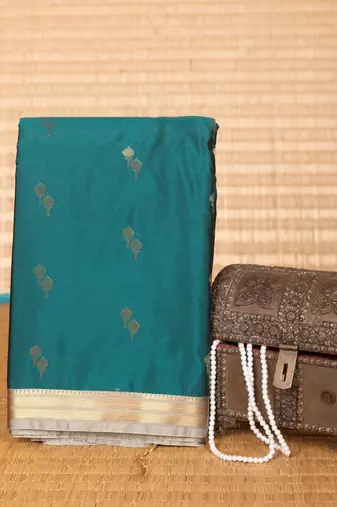 Sacramento green and steel grey small border semi silk saree