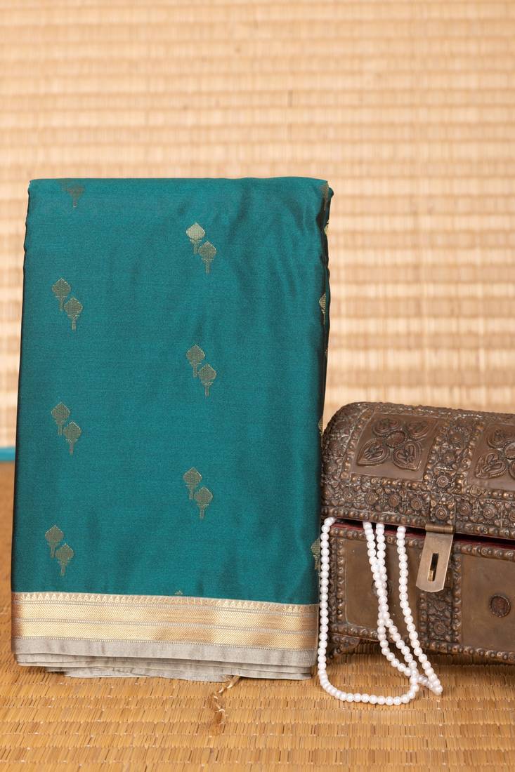 Sacramento green and steel grey small border semi silk saree