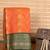 Orange and green semi silk saree