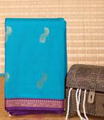 Peacock blue and purple small border silk saree