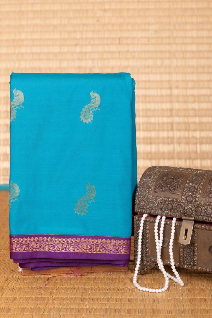 Peacock blue and purple small border silk saree