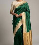 Forest green and beige temple border soft silk saree