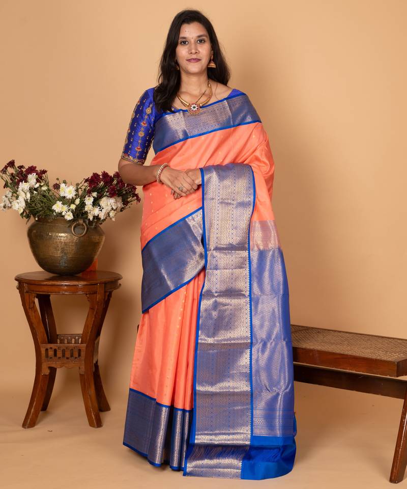 Salmon pink and cobalt blue korvai pure kanchi silk saree