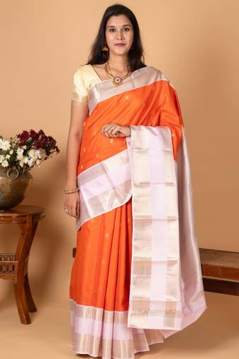Bright orange and powder pink retta patta border pure kanchi silk saree