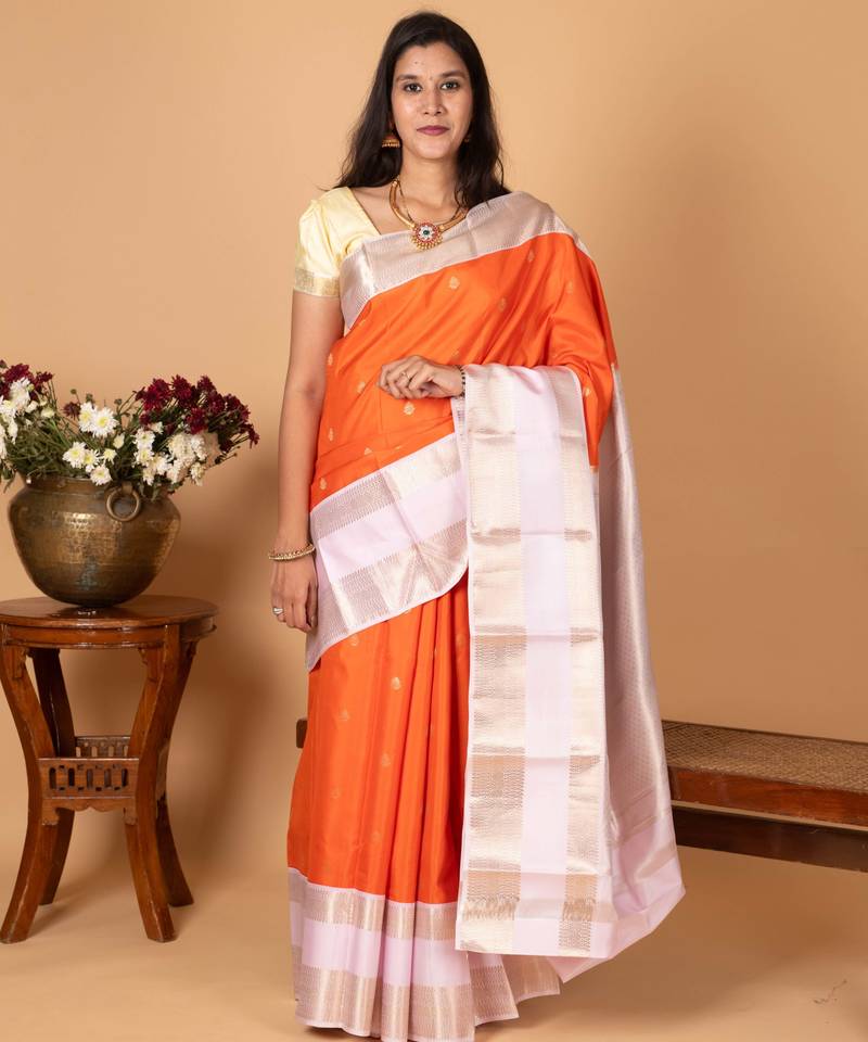 Bright orange and powder pink retta patta border pure kanchi silk saree