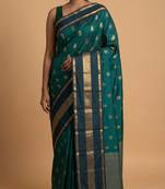 Peacock green traditional big border pure touch silk saree