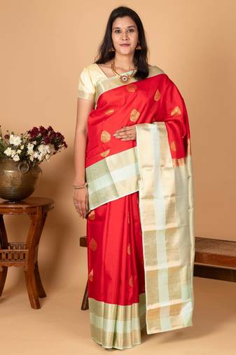 Chilli red and pastel green korvai pure silk saree