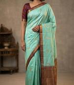 Seafoam green and garnet maroon small border semi silk saree