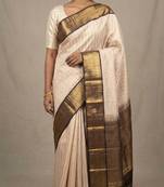 Champagne pink and pakku striped pure touch silk saree