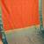 Dual tone orange and teal green small border semi silk saree