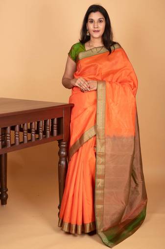 Coral orange and dual tone green zero zari kanchi silk saree with blouse