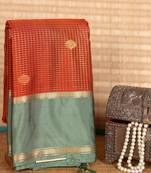 Rust orange and mint green semi silk saree