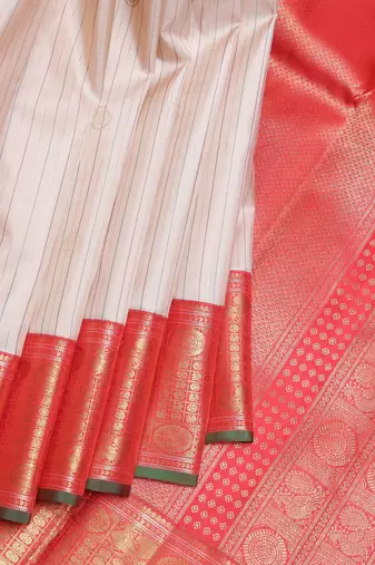 Blush pink and red pure zari silk saree