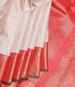 Blush pink and red pure zari silk saree