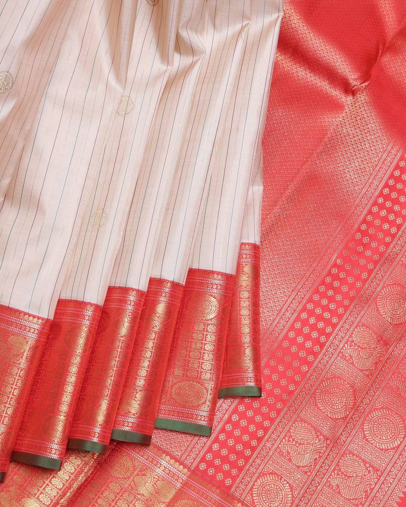 Blush pink and red pure zari silk saree