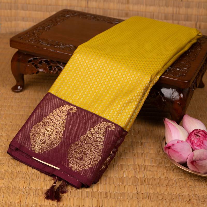 Saffron yellow and maroon soft silk saree