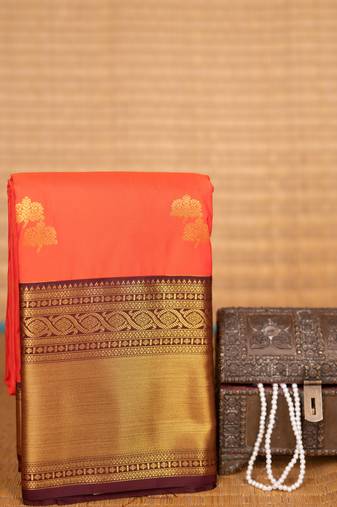 Bright orange and hickory brown kanchi semi silk saree