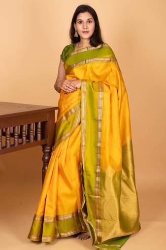 Royal yellow and dual tone green retta patta border pure kanchi silk saree