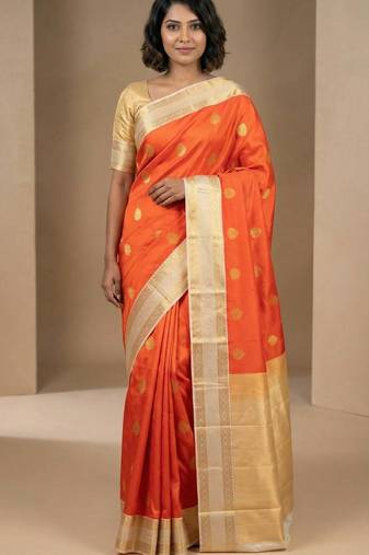 Persimmon orange and offwhite semi silk saree