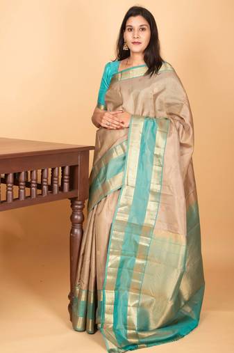 Oatmeal white and dual tone blue retta patta border pure kanchi silk saree