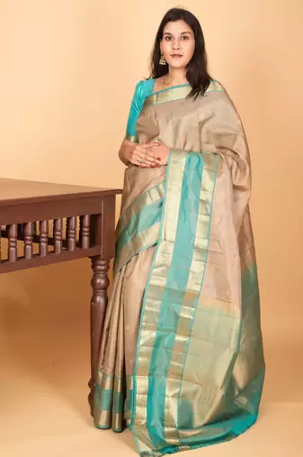 Oatmeal white and dual tone blue retta patta border pure kanchi silk saree