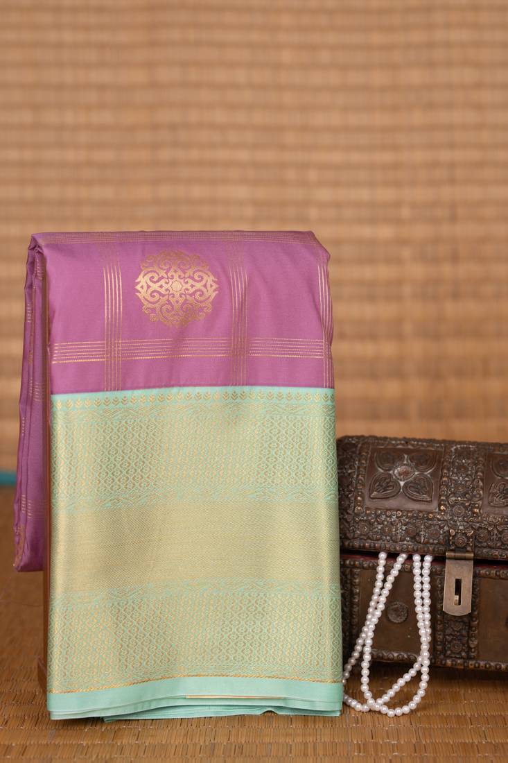 Mauve pink and pastel green kanchi soft silk saree