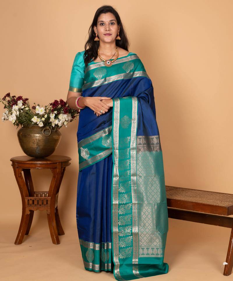 Peacock blue and teal green checked pure silk saree