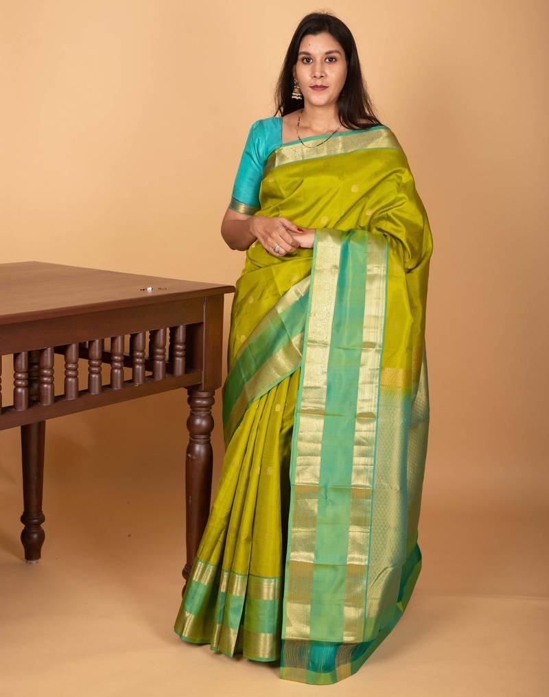 Apple green and dual tone blue butta pure kanchi silk saree