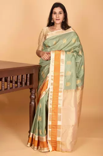 Pastel green and pastel pink retta patta temple border pure kanchi silk saree