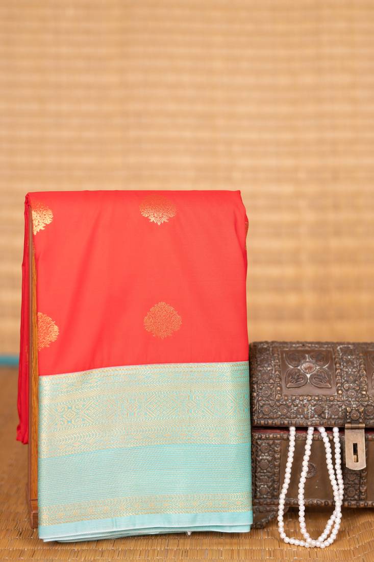 Red orange and pastel blue semi silk saree