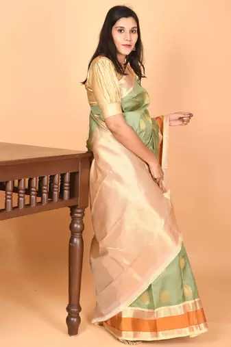 Pastel green and pastel pink retta patta temple border kanchi silk saree with blouse