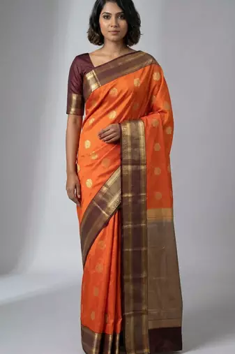 Pumpkin orange and chocolate brown semi silk saree